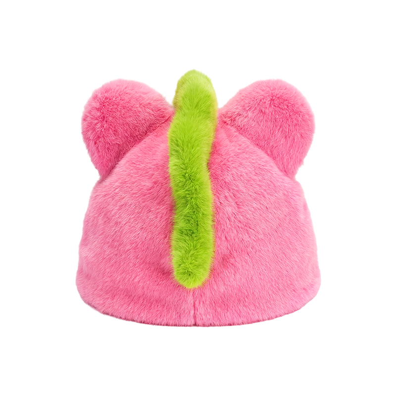 緑のたてがみの帽子をかぶったピンクのユニコーン