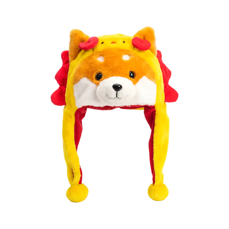 赤いたてがみの豪華な帽子をかぶった黄色い柴